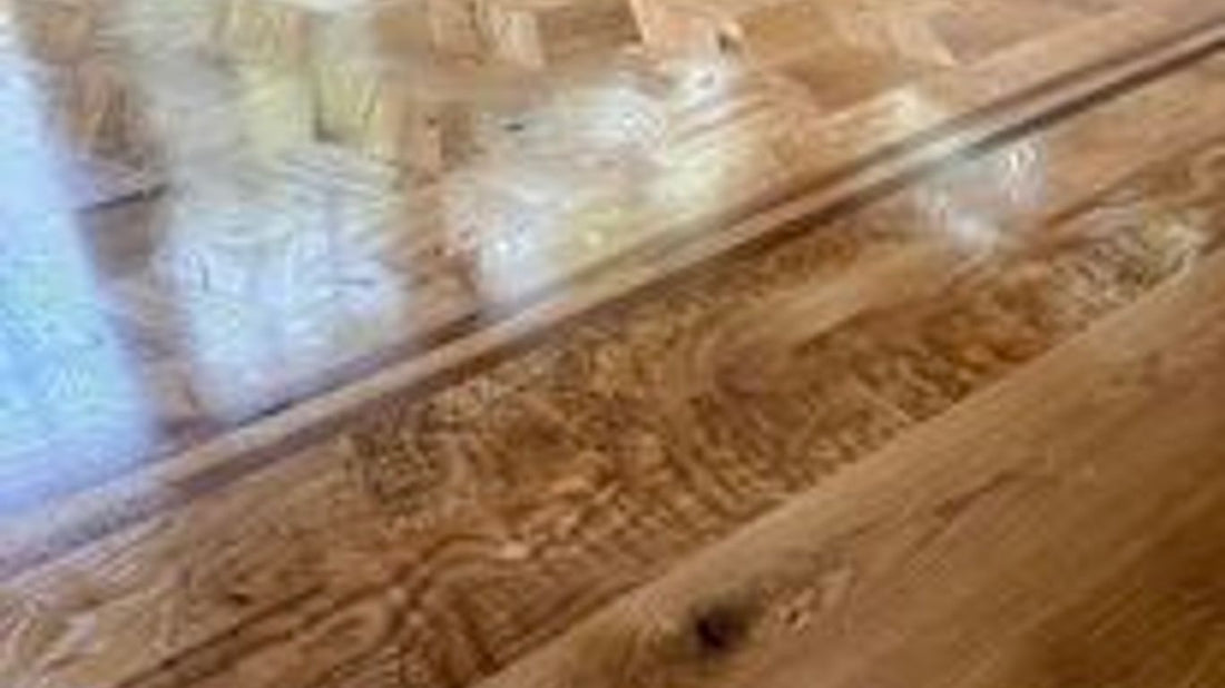 Wooden floor with intricate patterns and a polished finish.